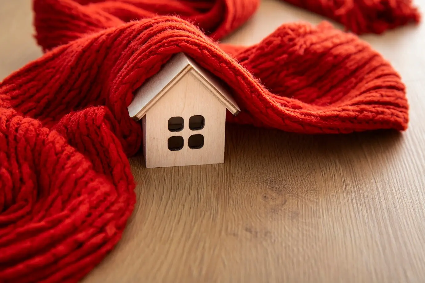 Concept of a cozy house featuring a wooden toy house